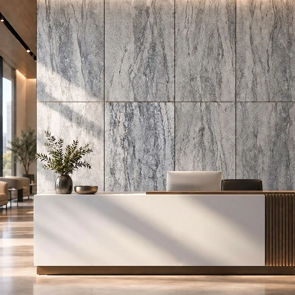 Office reception desk in front of a grey stone wall